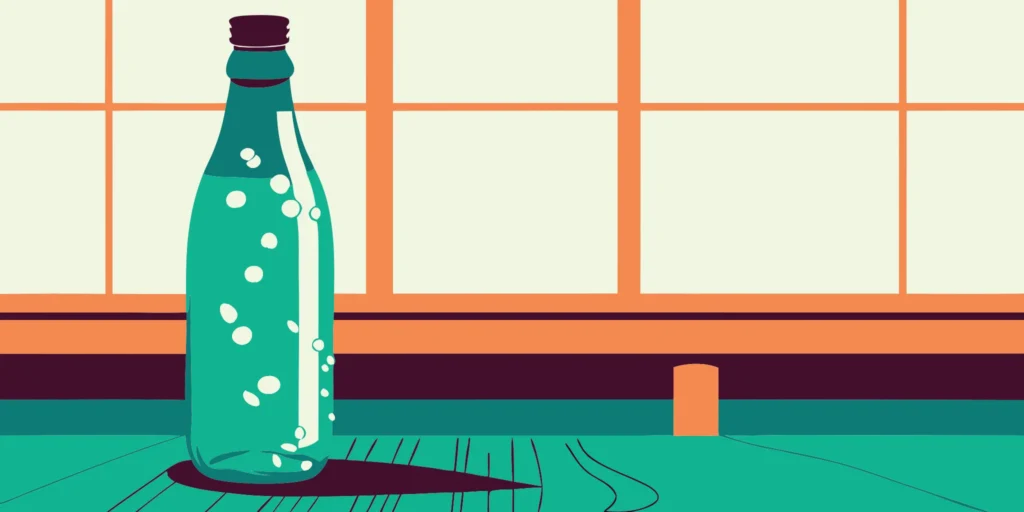 Cold ramune bottle with a marble stopper.