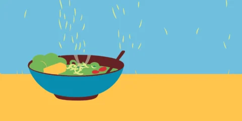 A bowl of vegetarian ramen from a top restaurant, featuring a rich broth and fresh toppings.